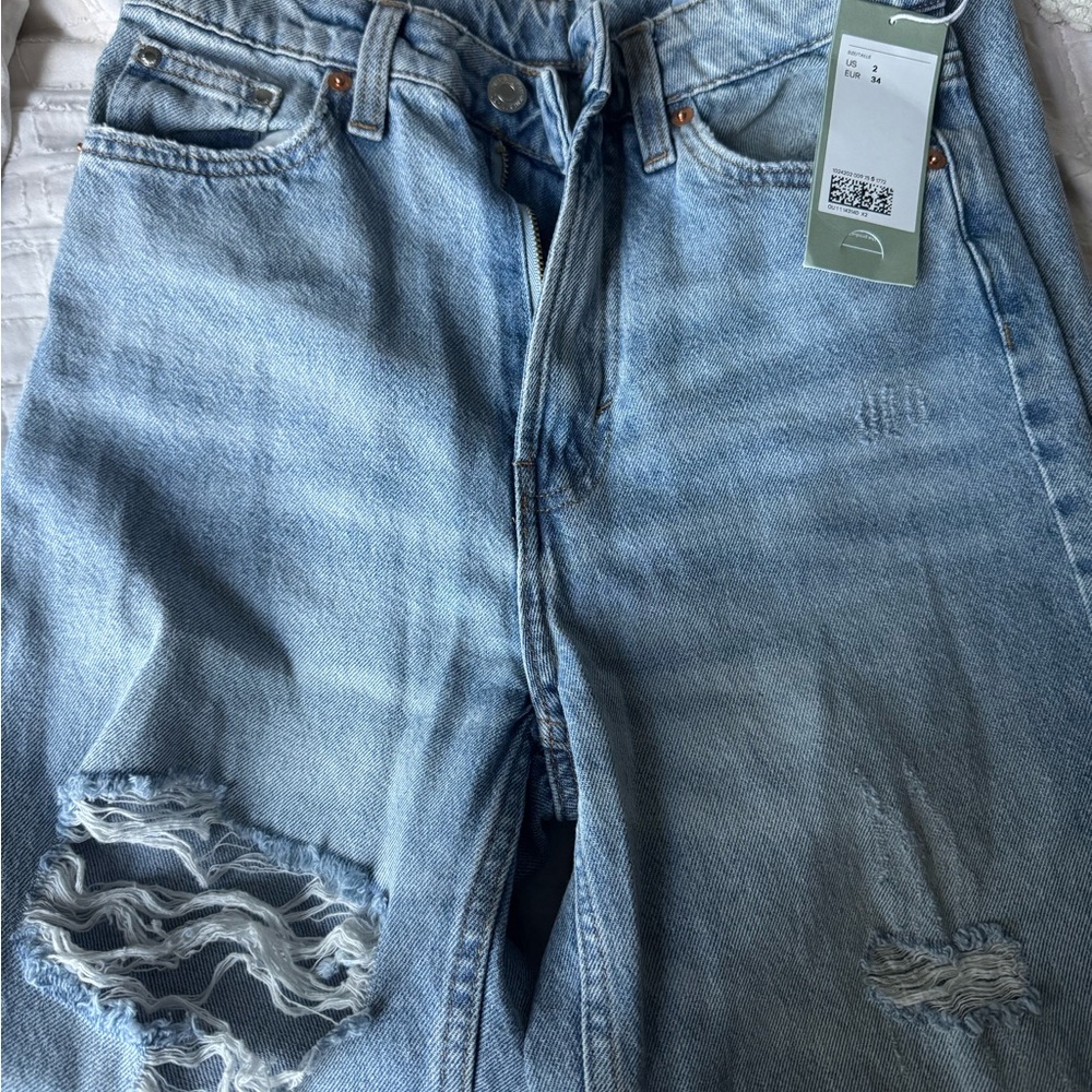 Distressed Light Blue Jeans